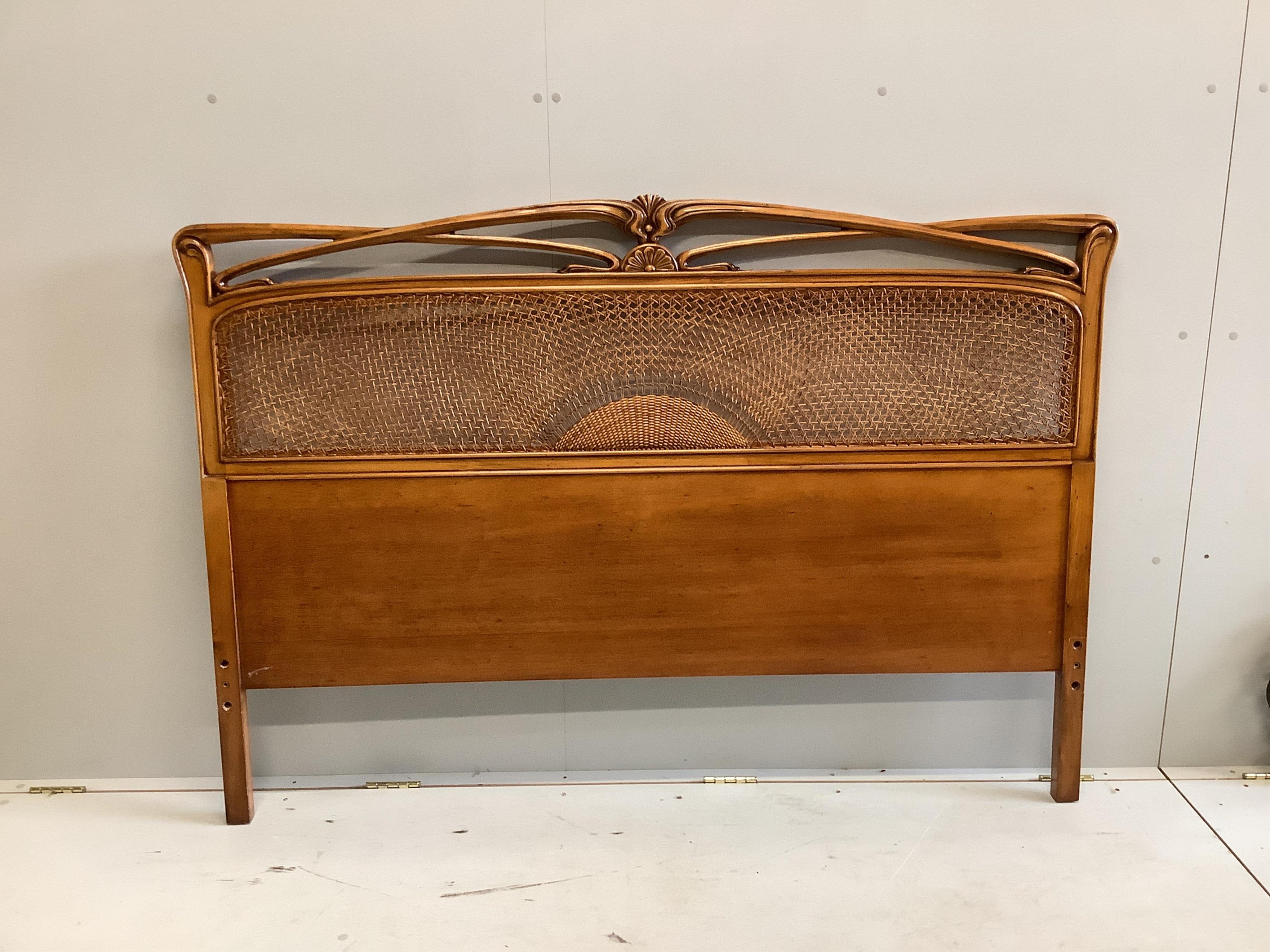 A pair of reproduction Gallé style burr elm bedside chests, width 51cm, depth 36cm, height 70cm, together with a matching caned headboard. Condition - good